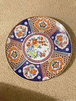 Front view showing full Imari floral and bird design