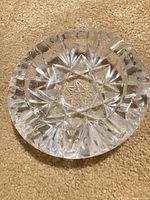 Top view of clear lead crystal ashtray showing Star of David cut pattern