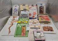 Wide shot of over 50 sealed pantyhose packages from multiple brands