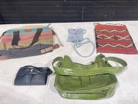 Overview of five bags on table