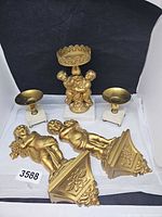 Group view showing all candle holders and wall plaques