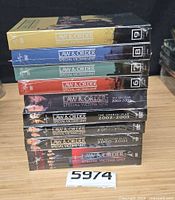 Stack of ten SVU DVD box sets showing sealed shrink-wrap and season subtitles