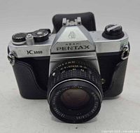 Front view of Asahi Pentax K1000 with attached SMC Pentax 50mm lens
