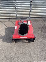 Top front view showing housing, handle bars, power curve label