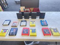 Overall view of all cartridges, protective shells and carrier on table