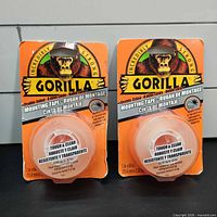 Front view of two blister-packed rolls of Gorilla Tough & Clear double-sided mounting tape