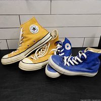 Side view of both pairs showing colors and style