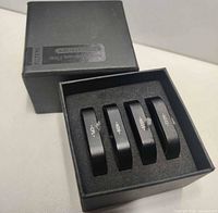 Boxed set showing four TELESIN filters labeled CPL, ND8, ND16, ND32 in foam insert beside outer box