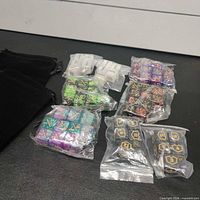 All dice packs and two black drawstring bags