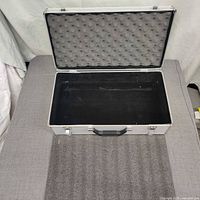 Case open showing full interior and foam padding