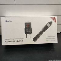 Retail box front showing heater image and controller