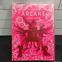 Front cover of The Art and Making of Arcane League of Legends hardcover book in shrink wrap
