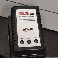 Top view of charger showing model name and specifications