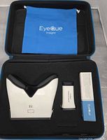Interior of hard case showing Insight Plus screener, VisionCheck device, PDCheck boxed tool, blue accessory pouch