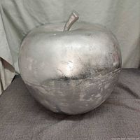 Full view of aluminum apple sculpture