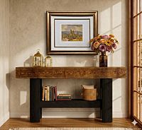 Framed lithograph displayed above console