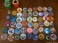 Overview of numerous pogs laid out with plastic tubes visible