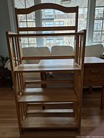 Front view of solid wood foldable bookcase