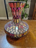 Front view showing full vase shape and mosaic pattern