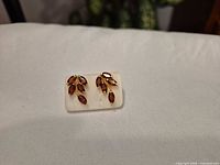 Earrings on display pad showing overall design