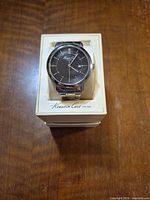 Front view of Kenneth Cole watch in original box