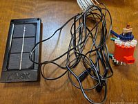 front view of solar panel, wire harness, motor assembly