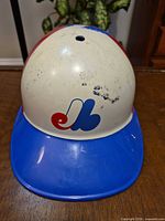 Front view showing Expos logo and blue brim