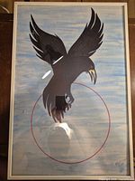 Front view of framed artwork showing image, frame, glazing, and overall condition