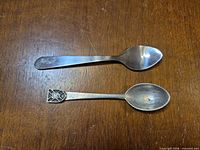 Both teaspoons top view showing styles and materials