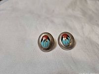 front view of both inlay earrings