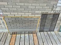 Both fireplace screens side by side for size and style comparison