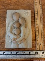 Front view of Willow Tree bas-relief plaque beside ruler showing dimensions