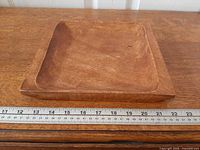 Top view showing full square wooden tray with ruler for scale