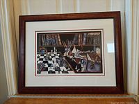 Full view of framed print on ledge