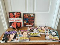 Full lot showing all seven publications spread out