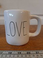 Front view showing ‘LOVE’ text and shape