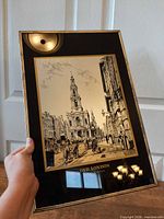 Front view of framed mirrored lithograph showing entire piece