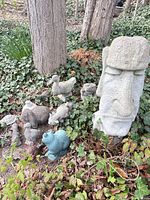 Group shot showing Moai head, duck, rabbits, frogs and surrounding items