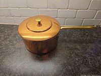 Top view of saucepan with lid in place