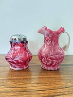 Front view of both glass pieces showing color, shape, and pattern