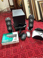Complete lot showing subwoofer, two satellites, boxed Z205, two mice