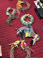 All six wreaths arranged on carpet