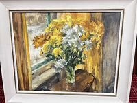 Frontal view of framed oil painting showing subject and frame