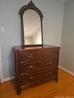 Front view of dresser with attached mirror