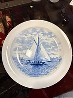 Front view of Wildwood blue & white sailboat transferware plate