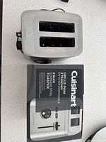 Toaster top view alongside original box