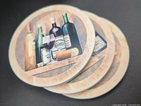 Stacked view of three ceramic coasters showing design and edge texture