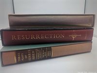 Spines of the three Heritage Press books in slipcases