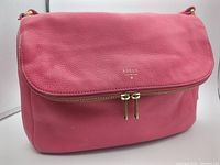 Front view of Fossil Preston crossbody showing flap, zipper pocket and overall color