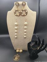 Full lot on display bust and hand form